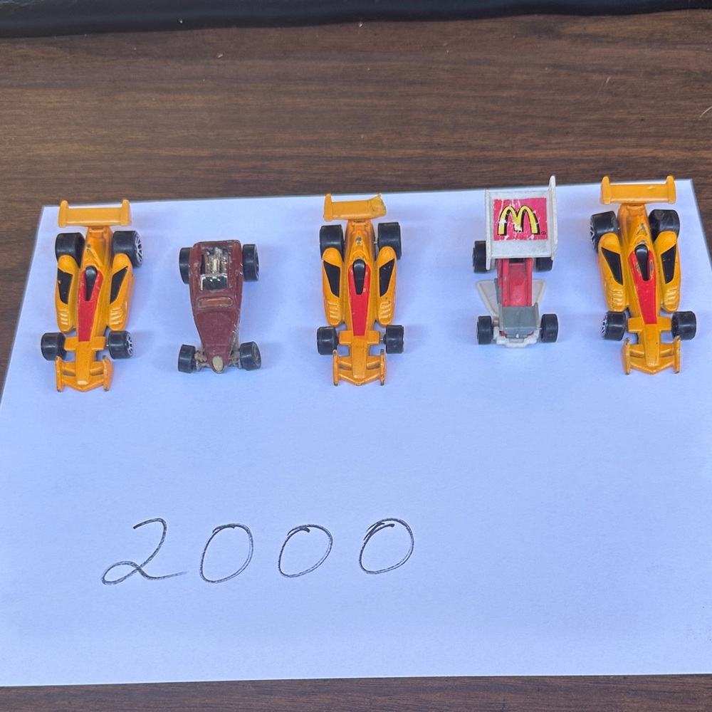 Hot Wheels Die Cast Toy Car Collection - Orange, Red, and Brown, white.